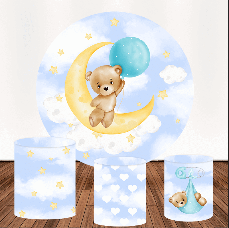 Round backdrop featuring a teddy bear on a crescent moon with a blue balloon, surrounded by clouds and stars, paired with three matching cylinder covers with heart, star, and teddy bear sling designs.