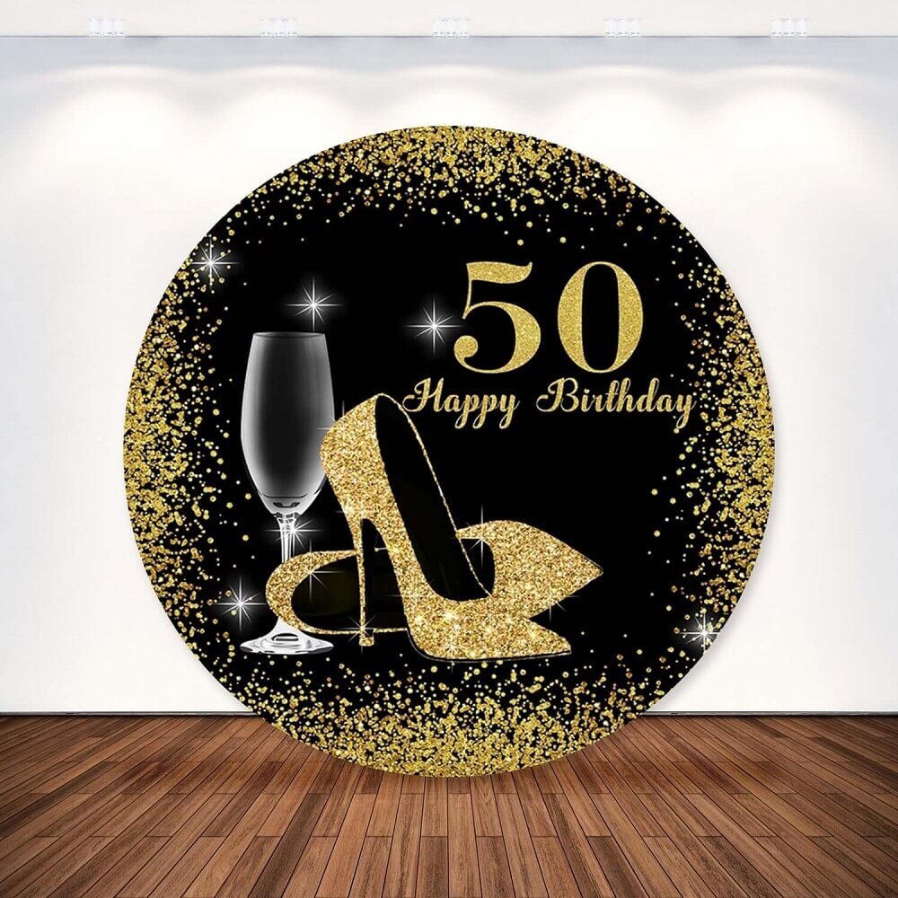Black and gold 50th birthday backdrop with glitter heels and wine glass, perfect for elegant women’s celebrations.