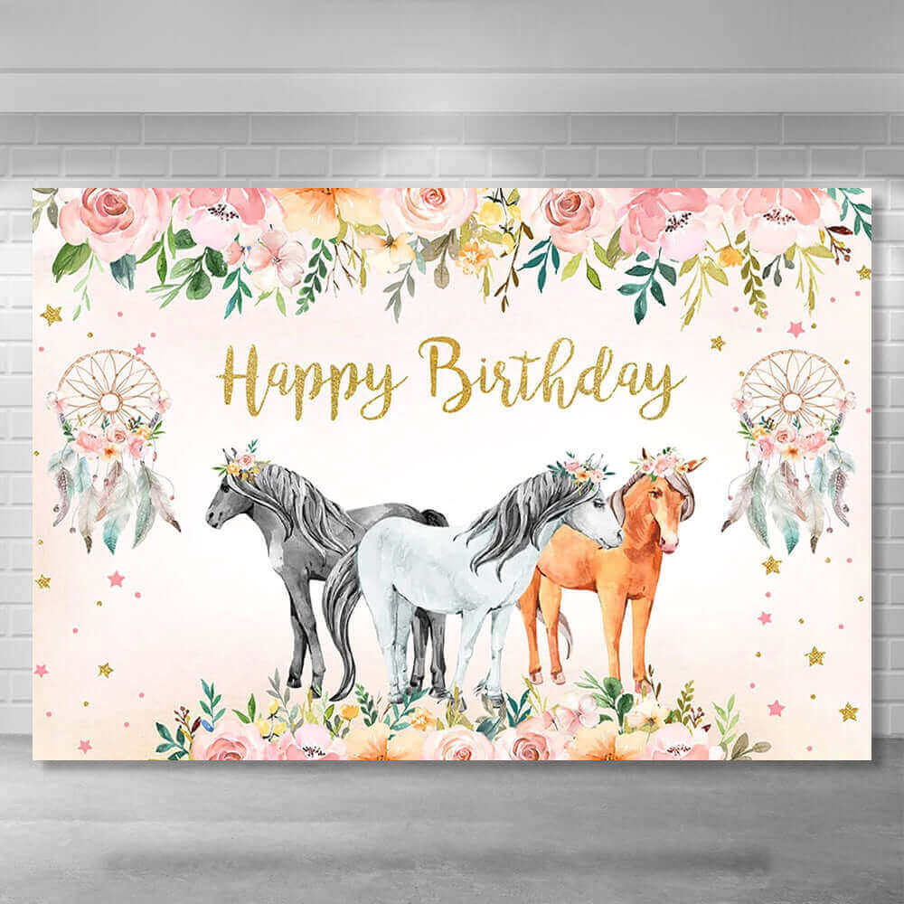 Horse-themed birthday party backdrop with three watercolor horses wearing floral crowns, surrounded by pink roses, greenery, dreamcatchers, and gold accents, perfect for boho and rustic celebrations.