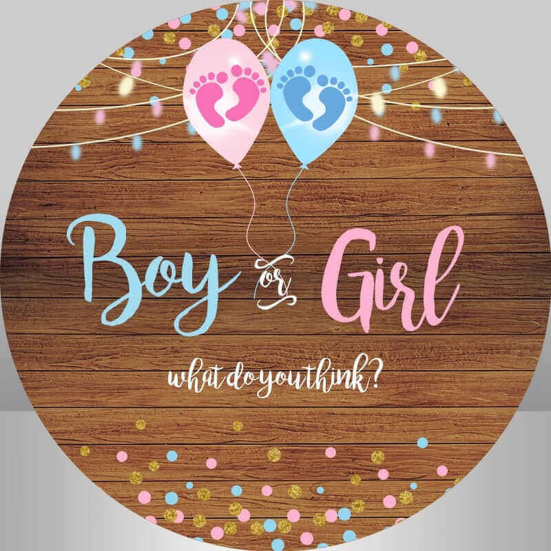 Gender reveal backdrop with pink and blue balloons, footprints, and rustic wood design for baby celebrations.