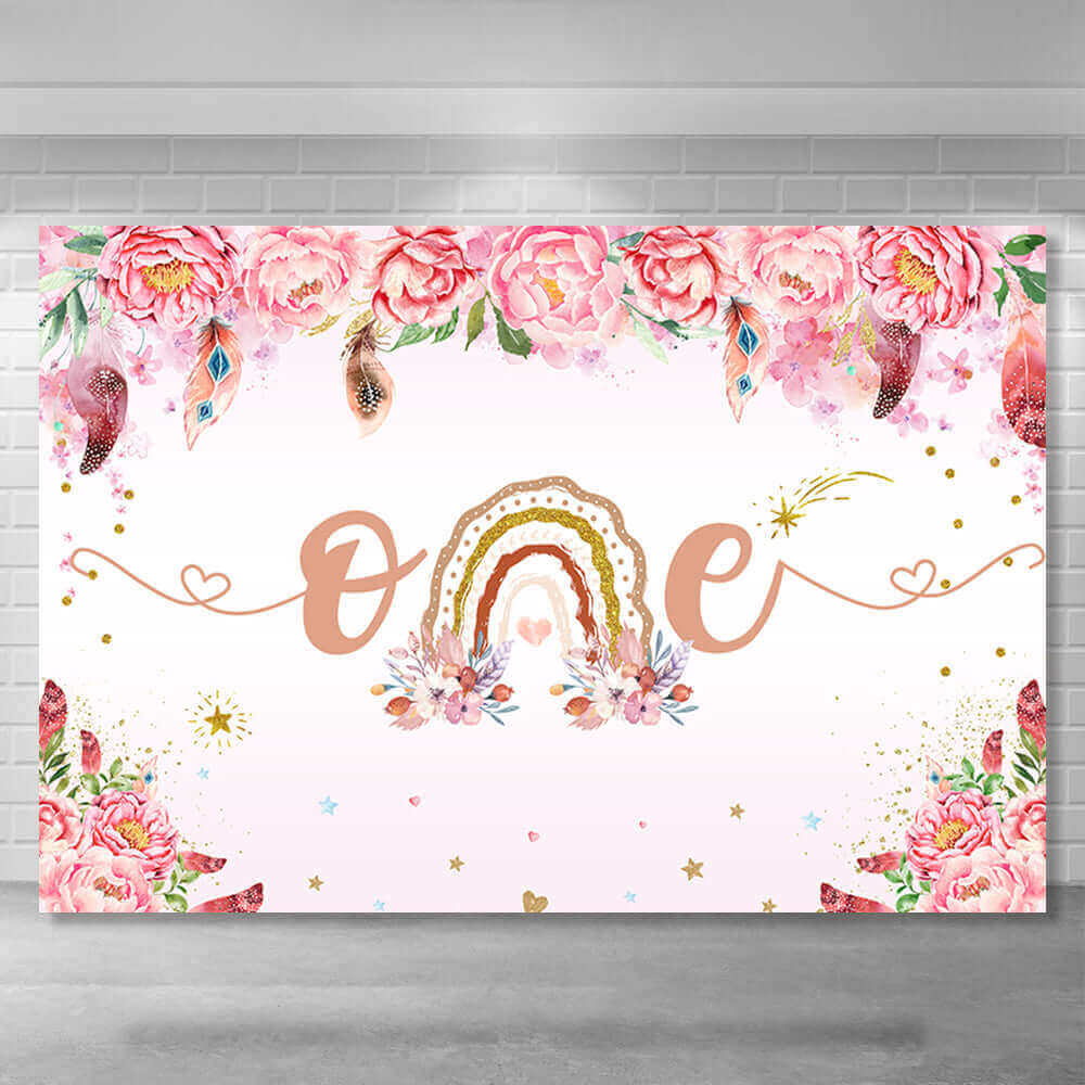 Boho-themed backdrop with pink watercolor peonies, a rainbow centerpiece, and 'One' text, designed for baby showers and first birthdays.