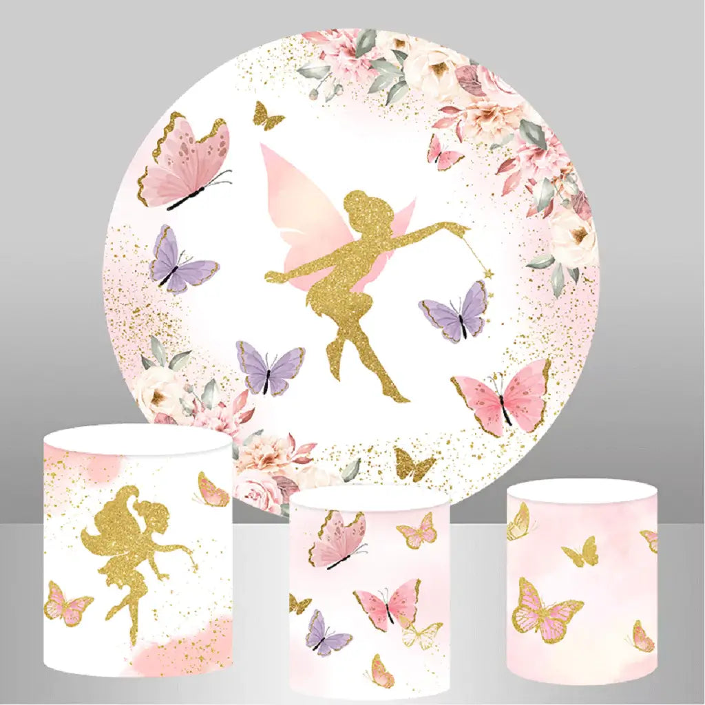 A fairy-themed decor set featuring a round backdrop with a golden fairy silhouette surrounded by pink and purple butterflies, floral accents, and cylinder covers with matching butterfly and fairy designs.