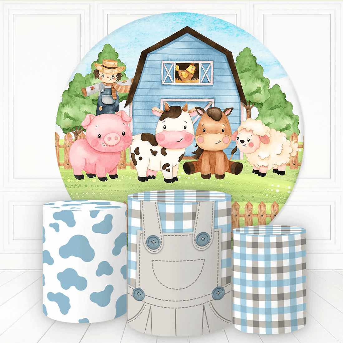 A farm-themed party decor set featuring a circular blue barn backdrop with a farmer, pig, cow, horse, and sheep, accompanied by three decorative cylinder covers with cow print, gingham, and checkered designs.