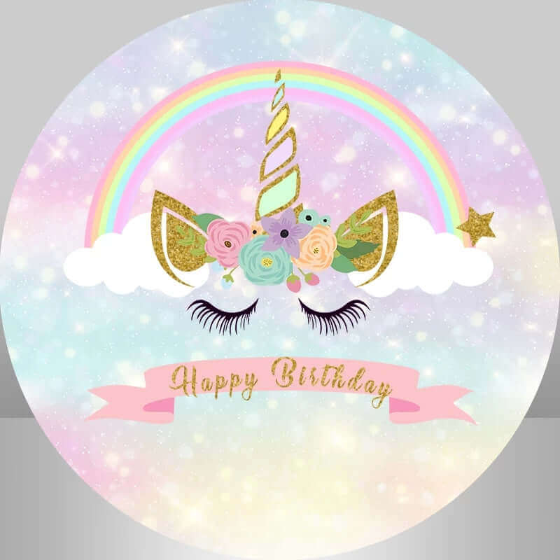 Round unicorn birthday backdrop with golden glitter unicorn horn, pastel rainbow, floral accents, and "Happy Birthday" text in a pink ribbon, perfect for magical celebrations.