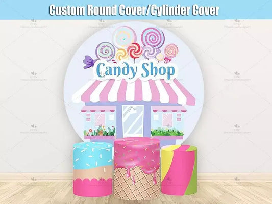A round candy shop-themed party backdrop with colorful lollipops and pastel accents, paired with three cylinder covers featuring candy-inspired designs.