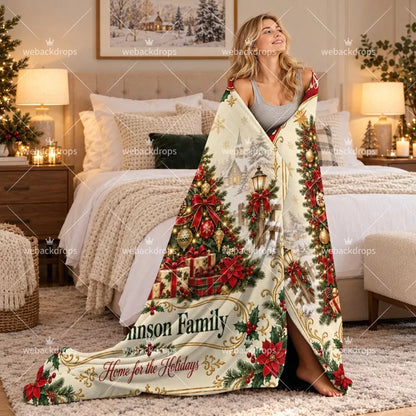 Woman wrapped in a custom family holiday blanket featuring Christmas greenery, red bows, winter scenery and personalized name.
