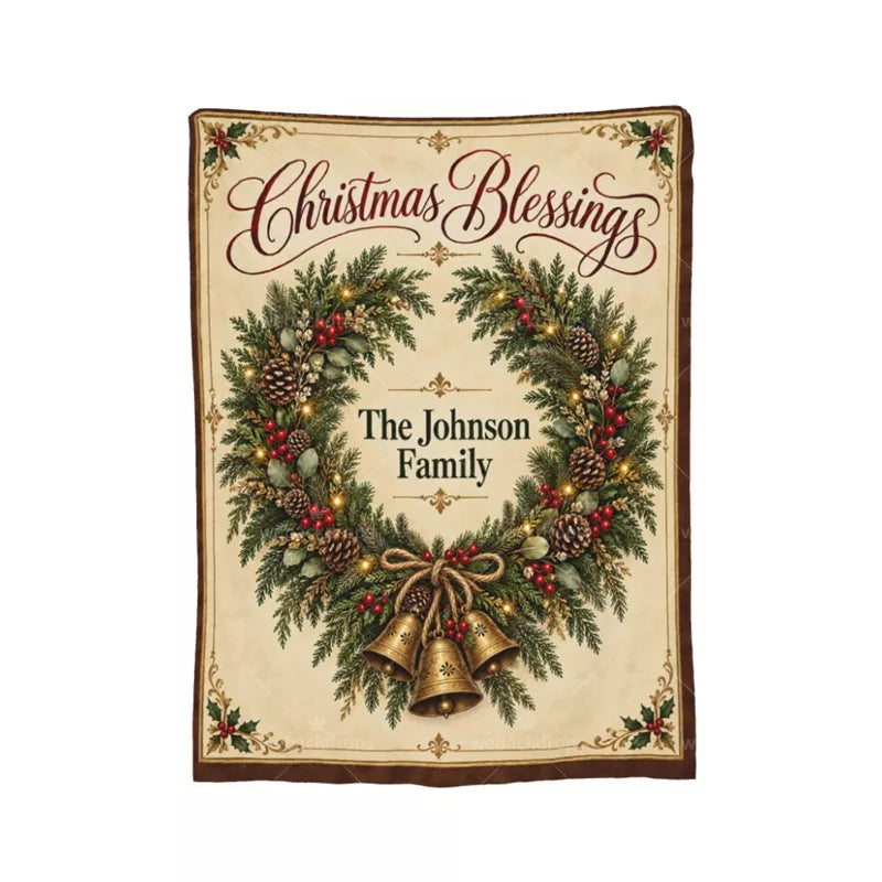 Full view of a personalized Christmas Blessings blanket with an open evergreen wreath, three vintage golden bells, and The Johnson Family name.