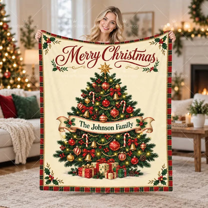 Personalized family Christmas blanket with custom name and Christmas tree design, displayed in a cozy holiday living room.
