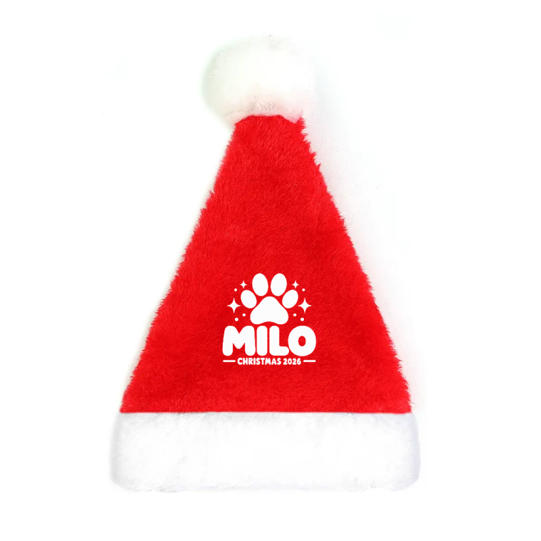 Front view of a personalized red pet Santa hat featuring the name MILO, a white paw print, and Christmas 2026 lettering.