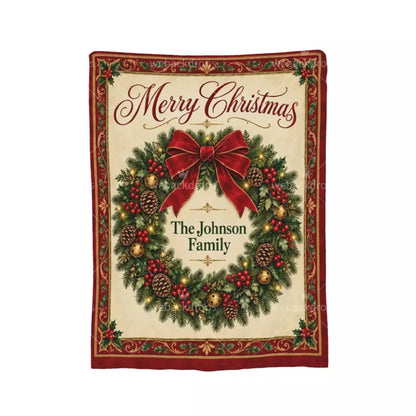 Full view of a personalized vintage Christmas wreath blanket with Merry Christmas lettering, red decorative border, and The Johnson Family name.