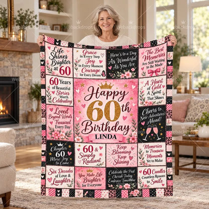 Woman holding a personalized 60th birthday blanket with floral quotes, gold number 30 and custom name LINDA
